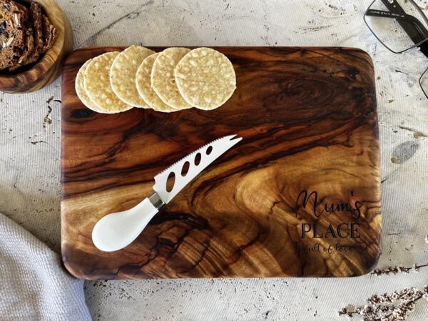 cheese board and small wooden serving bowl